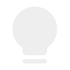 A simple, light gray outline of a light bulb on a white background, with minimal detail and soft edges.